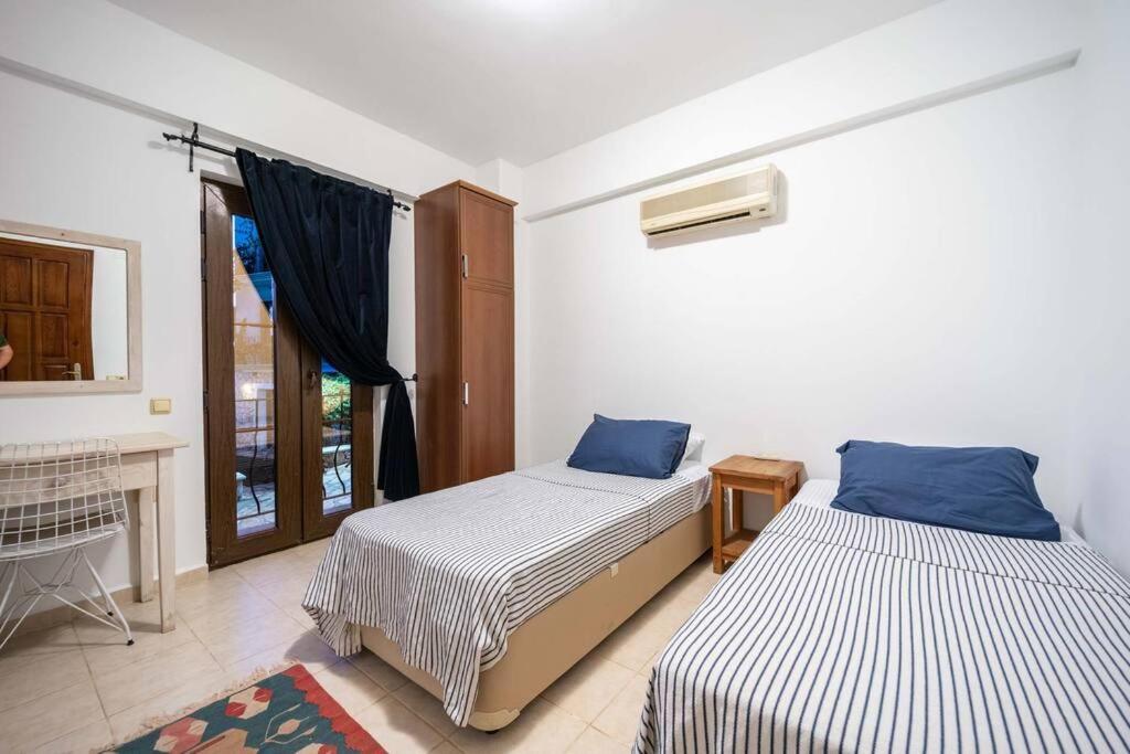 Azure Apartment With Sea View In كالكان المظهر الخارجي الصورة